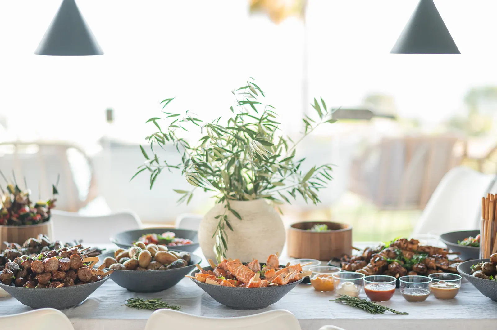 Buffet catering — grill spread with olive branches